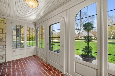 This stately stone Tudor is located east of Lake Drive, just - photo 6