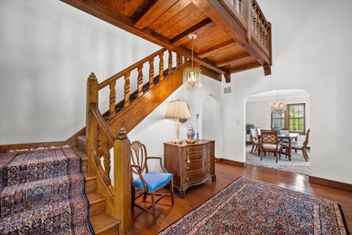 This stately stone Tudor is located east of Lake Drive, just - photo 9