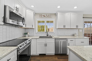 Over $100,000 in updates elevate this expansive, like-new - photo 6