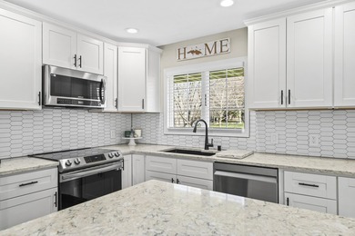 Over $100,000 in updates elevate this expansive, like-new - photo 7