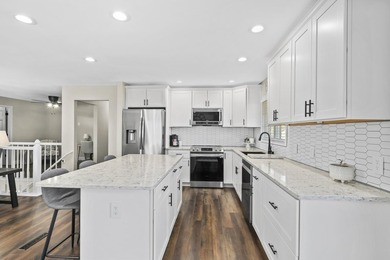 Over $100,000 in updates elevate this expansive, like-new - photo 8