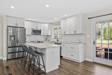 Over $100,000 in updates elevate this expansive, like-new - photo 9