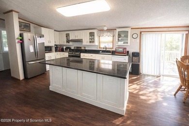 Check out this well-maintained 2003 mobile home that offers