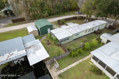 Lake Home For Sale in Satsuma, Florida