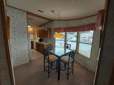 This charming 2 bedroom 2 bath home is move in ready. At almost - photo 3
