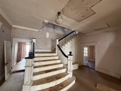 An American Four Square home built in 1911 exudes timeless charm