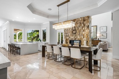 Beyond the gates of a private motor court, this six-bedroom golf - photo 11