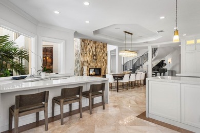 Beyond the gates of a private motor court, this six-bedroom golf - photo 12