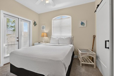 Discover coastal living just steps from the sugar-white sands of - photo 18
