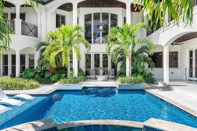 Beyond the gates of a private motor court, this six-bedroom golf - photo 26