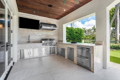 Beyond the gates of a private motor court, this six-bedroom golf - photo 27