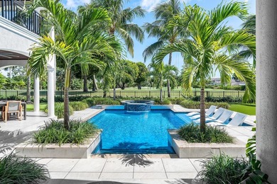 Beyond the gates of a private motor court, this six-bedroom golf - photo 30