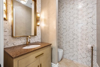 Beyond the gates of a private motor court, this six-bedroom golf - photo 35