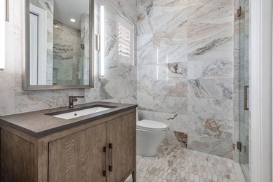 Beyond the gates of a private motor court, this six-bedroom golf - photo 39