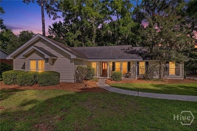 Welcome home to this lovely 4-bedroom, 2-bath residence in the - photo 2