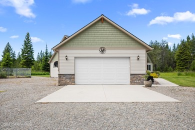 Enjoy the best of North Idaho living on 10 private acres with - photo 36