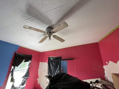 A Fixer Upper with lots of Potiential!! An ideal situation for - photo 17