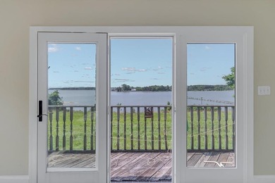 Stunning brick home built on 2 waterfront lots, in a premier - photo 46
