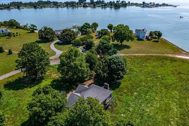 Stunning brick home built on 2 waterfront lots, in a premier - photo 58