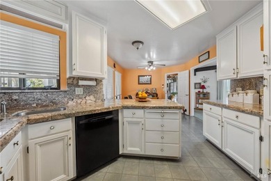 Step inside through a stunning entryway that sets the tone for - photo 9