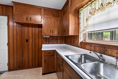 This charming all-brick 4-bedroom, 2-bath home has been lovingly - photo 13