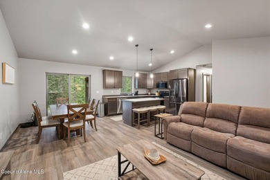 Tucked into a beautiful, wooded 3.23-acre setting, this inviting - photo 3
