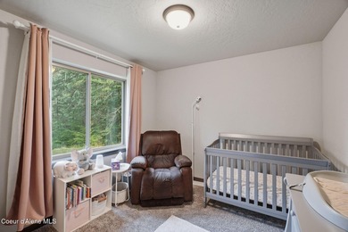 Tucked into a beautiful, wooded 3.23-acre setting, this inviting - photo 10