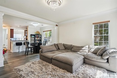Welcome to this highly sought-after first-floor end unit located - photo 12