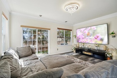 Welcome to this highly sought-after first-floor end unit located - photo 13