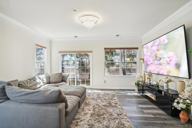 Welcome to this highly sought-after first-floor end unit located - photo 14