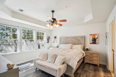 Welcome to this highly sought-after first-floor end unit located - photo 15