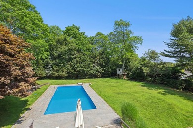 Perfectly situated on an acre in the heart of Water Mill, this - photo 16