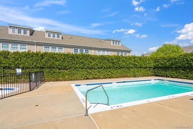 Welcome to this highly sought-after first-floor end unit located - photo 20