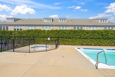 Welcome to this highly sought-after first-floor end unit located - photo 21