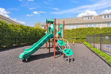 Welcome to this highly sought-after first-floor end unit located - photo 23