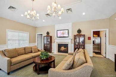 Welcome to this highly sought-after first-floor end unit located - photo 24