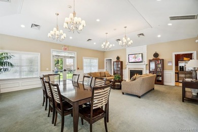 Welcome to this highly sought-after first-floor end unit located - photo 26