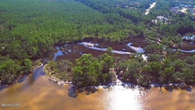 Gorgeous +/-4.4 acre secluded property on West Bay. Located at - photo 15