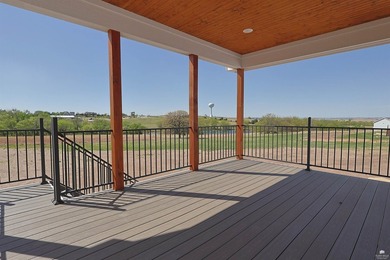 Set on two scenic acres with tranquil pond views, this - photo 4