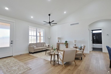 Set on two scenic acres with tranquil pond views, this - photo 8