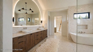 Set within the intimate seven-lot community of Basin Meadows - photo 10