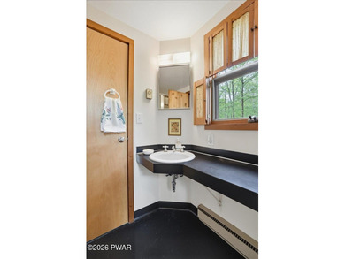 Classic Pocono home, with gambrel roofs, floor to ceiling glass - photo 7