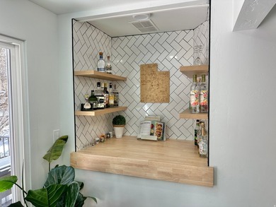 This beautifully remodeled home sits hidden, tucked away on a - photo 4