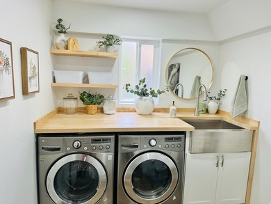 This beautifully remodeled home sits hidden, tucked away on a - photo 5