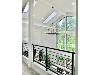 This beautifully remodeled home sits hidden, tucked away on a - photo 8