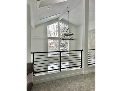 This beautifully remodeled home sits hidden, tucked away on a - photo 10