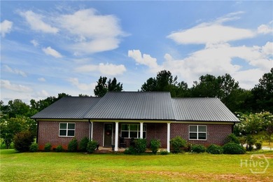Discover this custom-built brick ranch situated on over an acre - photo 1