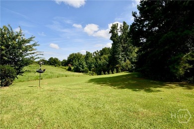 Discover this custom-built brick ranch situated on over an acre - photo 9