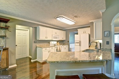 Make this charming home in the desirable swim and tennis - photo 15