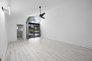 Move-in ready 3-bedroom, 2.5 bath lakefront home tucked away on